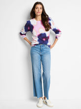 Load image into Gallery viewer, Expertly crafted to bring your style to life, the Nic & Zoe Blossom Blur Sweater adds a touch of vibrant color to your wardrobe. Its exquisite hazy floral print is built to last, making it the ideal knit for chilly days. This sweater is thoughtfully designed to match and enhance denim ensembles, with intricate plaited texture along the hem, collar, and cuffs. Made with fully fashioned knitwear techniques, this style is mindful of minimizing textile waste.