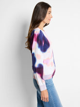 Load image into Gallery viewer, Expertly crafted to bring your style to life, the Nic & Zoe Blossom Blur Sweater adds a touch of vibrant color to your wardrobe. Its exquisite hazy floral print is built to last, making it the ideal knit for chilly days. This sweater is thoughtfully designed to match and enhance denim ensembles, with intricate plaited texture along the hem, collar, and cuffs. Made with fully fashioned knitwear techniques, this style is mindful of minimizing textile waste.