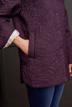 Load image into Gallery viewer, Perfect for the changing seasons, this lightweight shacket is a versatile addition to any wardrobe. Designed with style and practicality, it offers unmatched comfort with its quilted exterior that brings a touch of texture, and a fully lined interior adorned with an attractive pattern. It features an easy snap-up front, a traditional collared neckline, casual drop-shoulder sleeves, and handy side welt pockets, blending simplicity with sophistication.