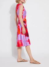 Load image into Gallery viewer, The Lysse Raquel Side Drape Printed Dress is a chic and elegant dress featuring a side drape design that adds a touch of sophistication. Fully lined for structure with light mesh, the Raquel is crafted from lightweight fabric in a striking color combination, making it perfect for both casual and formal occasions.