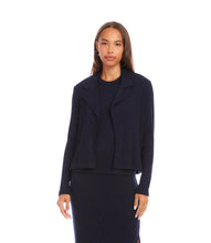 Load image into Gallery viewer, Woman wearing a navy blue jacket over a navy tank and navy skirt on a white background.