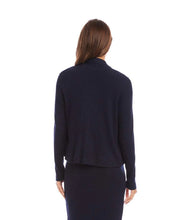 Load image into Gallery viewer, Woman wearing a navy blue jacket over a navy tank and navy skirt on a white background.