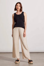 Load image into Gallery viewer, This basic sleeveless tank in black has been elevated to new levels with lace detailing across the chest and down one side of the back. We also love the stretch binding at the neck and armholes for added comfort, the pop-over scoop neckline, and its breeze-friendly sleeveless design.