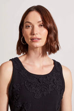 Load image into Gallery viewer, This basic sleeveless tank in black has been elevated to new levels with lace detailing across the chest and down one side of the back. We also love the stretch binding at the neck and armholes for added comfort, the pop-over scoop neckline, and its breeze-friendly sleeveless design.