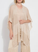 Load image into Gallery viewer, Add a layer of shimmer and sophistication with the Riva Mesh Sequin Shrug by Lysse. Designed to dazzle, this lightweight open-front shrug features a sheer mesh base adorned with delicate sequins that catch the light with every movement. The cropped silhouette and fluid drape make it the perfect finishing touch for sleeveless tops, dresses, or elevated evening looks.