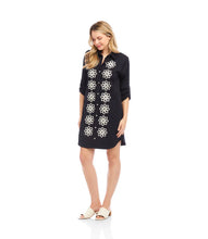 Load image into Gallery viewer, Elevate your wardrobe with the Roll Tab Embroidered Shirtdress by Karen Kane—a perfect blend of classic elegance and artisanal charm. Featuring delicate floral silk embroidery, a collared neckline, and adjustable roll-tab sleeves, this laid-back yet polished dress is designed for effortless style.