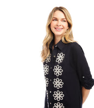 Load image into Gallery viewer, Elevate your wardrobe with the Roll Tab Embroidered Shirtdress by Karen Kane—a perfect blend of classic elegance and artisanal charm. Featuring delicate floral silk embroidery, a collared neckline, and adjustable roll-tab sleeves, this laid-back yet polished dress is designed for effortless style.