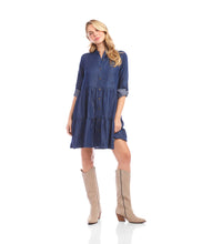 Load image into Gallery viewer, Woman wearing a blue dress and beige knee-high boots against a white background.