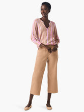 Load image into Gallery viewer, Nic & Zoe has once again exceeded expectations with their latest addition, the Rolling Dunes Sweater. This versatile piece has the appearance of a woven top, but surprises with its lightweight sweater material and a unique printed design in a striking pink and tan on a jersey knit base. Designed with an effortlessly flattering fit and a drapey feel, this sweater features an inverted pleat detail above the 3/4 sleeve cuffs for an added touch of sophistication.