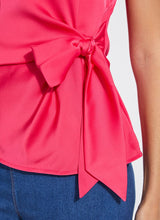 Load image into Gallery viewer, urn heads with the Rosalia Tie Drape Mix Media Top by Lysse—a stunning fusion of elegance and modern flair. Designed in a Pink Martini hue, this top features a graceful draped silhouette and a chic front side tie, effortlessly blending sophistication with a touch of playful charm. Crafted from premium mix-media fabric, it offers a luxurious feel and a flattering fit, making it perfect for both day-to-night styling. Whether paired with tailored trousers or sleek denim, this piece is a must-have.