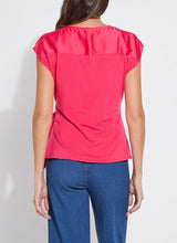 Load image into Gallery viewer, urn heads with the Rosalia Tie Drape Mix Media Top by Lysse—a stunning fusion of elegance and modern flair. Designed in a Pink Martini hue, this top features a graceful draped silhouette and a chic front side tie, effortlessly blending sophistication with a touch of playful charm. Crafted from premium mix-media fabric, it offers a luxurious feel and a flattering fit, making it perfect for both day-to-night styling. Whether paired with tailored trousers or sleek denim, this piece is a must-have.