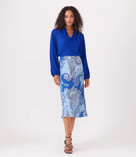 Load image into Gallery viewer, This stunning top in a striking blue color, exudes modern elegance with its luxurious moss crepe fabric that drapes gracefully and flatters the figure. With a sophisticated cowl neck, this top is suitable for both formal and casual occasions. Color- Royal blue. Cowl neck. Blouson sleeves. Elasticized cuffs. Fabric - Moss Crepe: 100% Polyester.