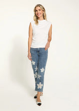 Load image into Gallery viewer, The white FDJ French Dressing Ruched Cap Sleeve Top is the epitome of sleek and stylish casual wear. With its side ruching, it creates a figure-flattering silhouette that adds a touch of elegance to any outfit. The cap sleeves and mock neck design offer a modern and trendy look, making it a perfect addition to your wardrobe. Whether you're dressing up for a special occasion or dressing down for a casual day out, this versatile top is a must-have.