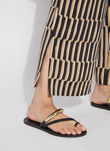 Load image into Gallery viewer, Refined and effortlessly chic, the Santana Pleated Trouser by Lysse is a modern wardrobe essential designed for the woman who values both comfort and sophistication. Crafted from breathable Stretch Woven fabric with 2X stretch, these trousers feature a flattering wide-leg silhouette, deep front pleats, and a concealed tricot front panel that smooths and shapes. The elasticized back waistband ensures a flexible fit, while functional side pockets with mesh facing reduce bulk without sacrificing practicality.