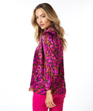 Load image into Gallery viewer, This elegant blouse is crafted from a luxuriously soft satin and features a button-up design with a shirt collar, and delicate pleating on its long-cuffed sleeves. Its versatility allows it to be worn for work and leisure alike. Color - Magenta, pink and coral. Floral print. Button down. Shirt collar. Subtle pleat detailing on sleeves. Long cuffed sleeves.