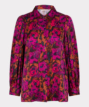 Load image into Gallery viewer, This elegant blouse is crafted from a luxuriously soft satin and features a button-up design with a shirt collar, and delicate pleating on its long-cuffed sleeves. Its versatility allows it to be worn for work and leisure alike. Color - Magenta, pink and coral. Floral print. Button down. Shirt collar. Subtle pleat detailing on sleeves. Long cuffed sleeves.