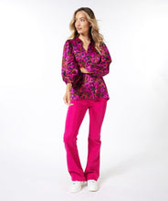 Load image into Gallery viewer, This elegant blouse is crafted from a luxuriously soft satin and features a button-up design with a shirt collar, and delicate pleating on its long-cuffed sleeves. Its versatility allows it to be worn for work and leisure alike. Color - Magenta, pink and coral. Floral print. Button down. Shirt collar. Subtle pleat detailing on sleeves. Long cuffed sleeves.