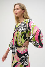 Load image into Gallery viewer, Admire the incomparable style of this stunning satin dress. The fabric showcases a vibrant retro print on a classic straight silhouette. The features a chic slit neckline adorned with gold ornaments, adding a hint of glamour to the design. The three-quarter bell sleeves complete the piece's polished look.