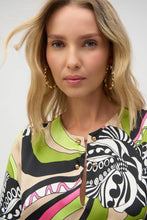 Load image into Gallery viewer, Admire the incomparable style of this stunning satin dress. The fabric showcases a vibrant retro print on a classic straight silhouette. The features a chic slit neckline adorned with gold ornaments, adding a hint of glamour to the design. The three-quarter bell sleeves complete the piece's polished look.