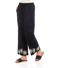 Load image into Gallery viewer, Refined yet effortlessly comfortable, the Sherrit Scallop Drawstring Pants by Karen Kane blend elegance with everyday ease. Crafted from black cotton woven fabric, these wide-leg pants feature delicate cream embroidery and a scalloped hem. Perfect for casual outings, workdays, or evening wear, these versatile embroidered pants pair beautifully with blouses, tanks, or structured tops.