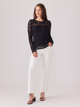 Load image into Gallery viewer, This top features a feminine and elegant design that enhances the natural contours of the body through its graceful silhouette. The flexible floral lace guarantees a comfortable and polished appearance, making it a versatile match for different bottoms, such as denim. The bodice is fully lined up to the chest, while the arms and upper chest are adorned with delicate lace.
