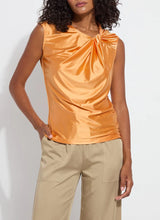 Load image into Gallery viewer, Add a touch of modern style with the Selene Twisted Shoulder Top in vibrant Solar Ray by Lysse. Featuring a unique twisted shoulder detail, this top combines comfort with chic sophistication. The soft, breathable fabric ensures all-day wearability, while the relaxed fit makes it perfect for casual, work, or evening outfits.
