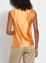 Load image into Gallery viewer, Add a touch of modern style with the Selene Twisted Shoulder Top in vibrant Solar Ray by Lysse. Featuring a unique twisted shoulder detail, this top combines comfort with chic sophistication. The soft, breathable fabric ensures all-day wearability, while the relaxed fit makes it perfect for casual, work, or evening outfits.