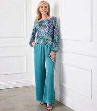 Load image into Gallery viewer, Enhance your wardrobe with our boatneck top, radiating bold sophistication. It features a vibrant floral print adorned with sparkling sequins, made from luxurious Italian fabric. This top complements a variety of bottoms, including your go-to denim. Stand out in style with this exquisite piece.