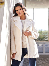 Load image into Gallery viewer, Stay warm and cozy with this brushed sherpa coat designed to keep you snug when the temperatures drop. Featuring a stylish cloverleaf lapel collar and front snaps, this coat will help you embrace the cold weather in both fashion and comfort.