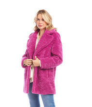 Load image into Gallery viewer, Woman wearing a bright orchid coat over a tan top and blue jeans against a white background.