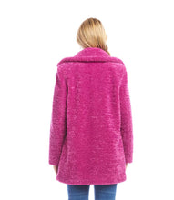 Load image into Gallery viewer, Woman wearing a bright orchid coat over a tan top and blue jeans against a white background.