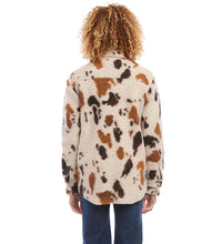 Load image into Gallery viewer, A stylish choice for crisp days, this relaxed-fit shirt jacket showcases a striking allover print, perfect for easygoing layering. Pairs beautifully with denim, faux leather pants or a brown or black trouser. Color- Shades of brown. Appaloosa print. Collared button down. Long sleeve. Side functional pockets.