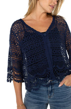Load image into Gallery viewer, Add a touch of sophistication to any ensemble with our stylish lace bolero. This short-sleeve piece boasts delicate scalloped edges and a singular button closure, making it a chic and polished addition to your wardrobe.