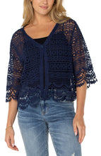 Load image into Gallery viewer, Add a touch of sophistication to any ensemble with our stylish lace bolero. This short-sleeve piece boasts delicate scalloped edges and a singular button closure, making it a chic and polished addition to your wardrobe.