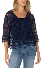 Load image into Gallery viewer, Add a touch of sophistication to any ensemble with our stylish lace bolero. This short-sleeve piece boasts delicate scalloped edges and a singular button closure, making it a chic and polished addition to your wardrobe.