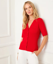 Load image into Gallery viewer, The Suzette Short Sleeve Ribbed Cardigan Sweater by Karen Kane is a versatile layering piece that blends cozy comfort with effortless style. Designed with a ribbed texture, short sleeves, and a V-neckline, this sweater offers a flattering, fitted silhouette that’s perfect for any occasion.