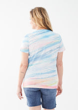 Load image into Gallery viewer, Discover the perfect blend of fashion and comfort with this knit top made of soft cotton slub jersey. The elegant fusion of style and everyday wear is enhanced by delicate strokes of pastel hues, making this top a standout choice. Color- Wind; Pastel colors. Length 26". Scoop neck. Short sleeves.