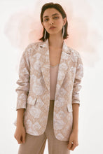 Load image into Gallery viewer, The Joseph Ribkoff Brocade Floral Print Blazer combines timeless charm with modern sophistication. Crafted from luxurious floral brocade fabric, this blazer is tailored with a classic notched collar and a single-button closure for a sleek, polished look. Versatile, this gorgeous jacket can be worn with denim to skirts. Fully lined for comfort, this standout piece adds a shimmering touch to your wardrobe.