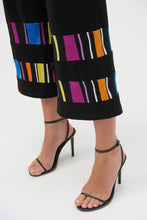Load image into Gallery viewer, Elevate your style with these sophisticated silky pull-on pants. The chic culotte silhouette radiates poise, while vibrant striped print bands accentuate the hems, adding a touch of distinctive charm.