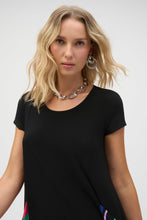 Load image into Gallery viewer, Refined style at its very best. This silky knit tunic's unique charm elevates any ensemble, with its lovely handkerchief detail at the hem. The scoop neckline and sleeveless design pair beautifully, lending the garment it’s simple elegance. The striped print band on the applied pockets accentuates the piece’s stunning contemporary look.