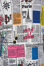 Load image into Gallery viewer, Enhance chic contemporary style with this knit blazer. The piece is expertly tailored a slightly fitted design that flatters any silhouette. An alluring all over word print offers distinctive charm, while the notched collar enhances the piece's refined appearance with contrasting tape trim and delicate rhinestone accents. A beautifully unique style, our Serita blazer pairs wonderfully with everything from denim to skirts.