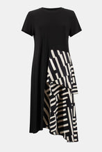 Load image into Gallery viewer, If you are looking for a comfortable and highly fashionable dress, our Soren knit woven dress is a beautiful addition to your wardrobe. A one piece, pullover dress, our Soren is a solid black on top and down one side of the dress, while the other half of its skirting is voluminous with a ruffled abstract pattern hem. This flowy dress feels as gorgeous as it looks! Color- Black and white. One piece dress. Abstract print on one side. Solid on the other. Solid color top. Ruffled hem on one side. No pockets.
