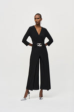 Load image into Gallery viewer, Boost your confidence in every stride with this stunning silky knit wrap jumpsuit. Designed with an overlapping culotte leg and elegant three-quarter sleeves, this garment exudes feminine grace and sophistication. Accentuate your figure with the waistline sash and sleek wrap neckline, while the delicate waist ornament adds a touch of unique charm.