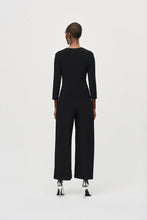 Load image into Gallery viewer, Boost your confidence in every stride with this stunning silky knit wrap jumpsuit. Designed with an overlapping culotte leg and elegant three-quarter sleeves, this garment exudes feminine grace and sophistication. Accentuate your figure with the waistline sash and sleek wrap neckline, while the delicate waist ornament adds a touch of unique charm.