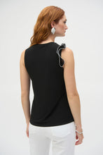 Load image into Gallery viewer, Embrace chic sophistication with the Joseph Ribkoff Silky Knit and Chiffon Fitted Top. designed with a crew neckline, sleeveless cut, and graceful ruffle detailing for a touch of elegance. Made from a blend of silky knit and chiffon fabrics, this lightweight top offers comfort and style in equal measure. Its timeless black and vanilla color palette ensures versatility for any wardrobe. Easy to care for, this fabulous top is perfect for layering or making a statement on its own.
