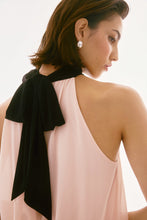 Load image into Gallery viewer, Exude sophistication in this wide leg jumpsuit, showcasing a contrasting chiffon blouson upper and a luxurious silky knit bottom. This one-piece garment features a mock collar with a lovely back bow tie. The fashionable wide leg combined with the shoulder-baring halter style creates a stunning ensemble. Part of Joseph Ribkoff's Signature collection.