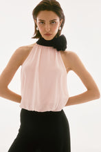 Load image into Gallery viewer, Exude sophistication in this wide leg jumpsuit, showcasing a contrasting chiffon blouson upper and a luxurious silky knit bottom. This one-piece garment features a mock collar with a lovely back bow tie. The fashionable wide leg combined with the shoulder-baring halter style creates a stunning ensemble. Part of Joseph Ribkoff's Signature collection.