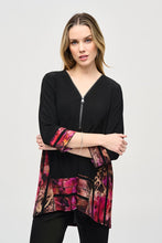 Load image into Gallery viewer, Experience ultimate comfort with this soft knit tunic featuring a stunning abstract striped burnout design. The high-low cut highlights the flared shape, while cuffed three-quarter sleeves add a polished touch. A zippered neckline adds a subtle yet eye-catching element, elevating the refined look of this tunic.
