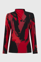 Load image into Gallery viewer, Upgrade your outfit with our silky knit top featuring a vibrant abstract print, long sleeves, and a flattering mock neck. The eye-catching color combination of black and shades of red will surely draw attention.