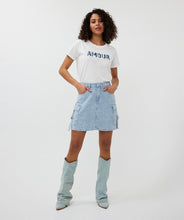 Load image into Gallery viewer, The EsQualo Distressed Jeans Skirt is a stylish denim skirt featuring a distressed design with cargo-style pockets and chic buckle details. It also has a unique button with inlaid rhinestones, adding a touch of elegance to its rugged charm. This versatile piece is perfect for casual outings or adding a trendy edge to your wardrobe.